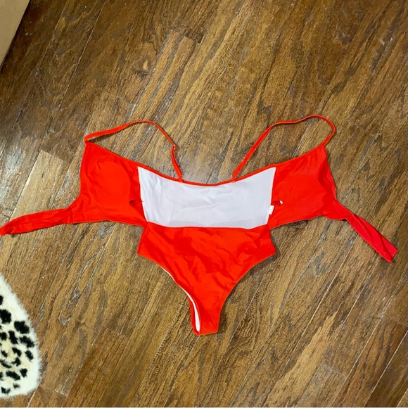 Knot Front Cut-Out One Piece Swimsuit
Color: Red - Picture 11 of 14